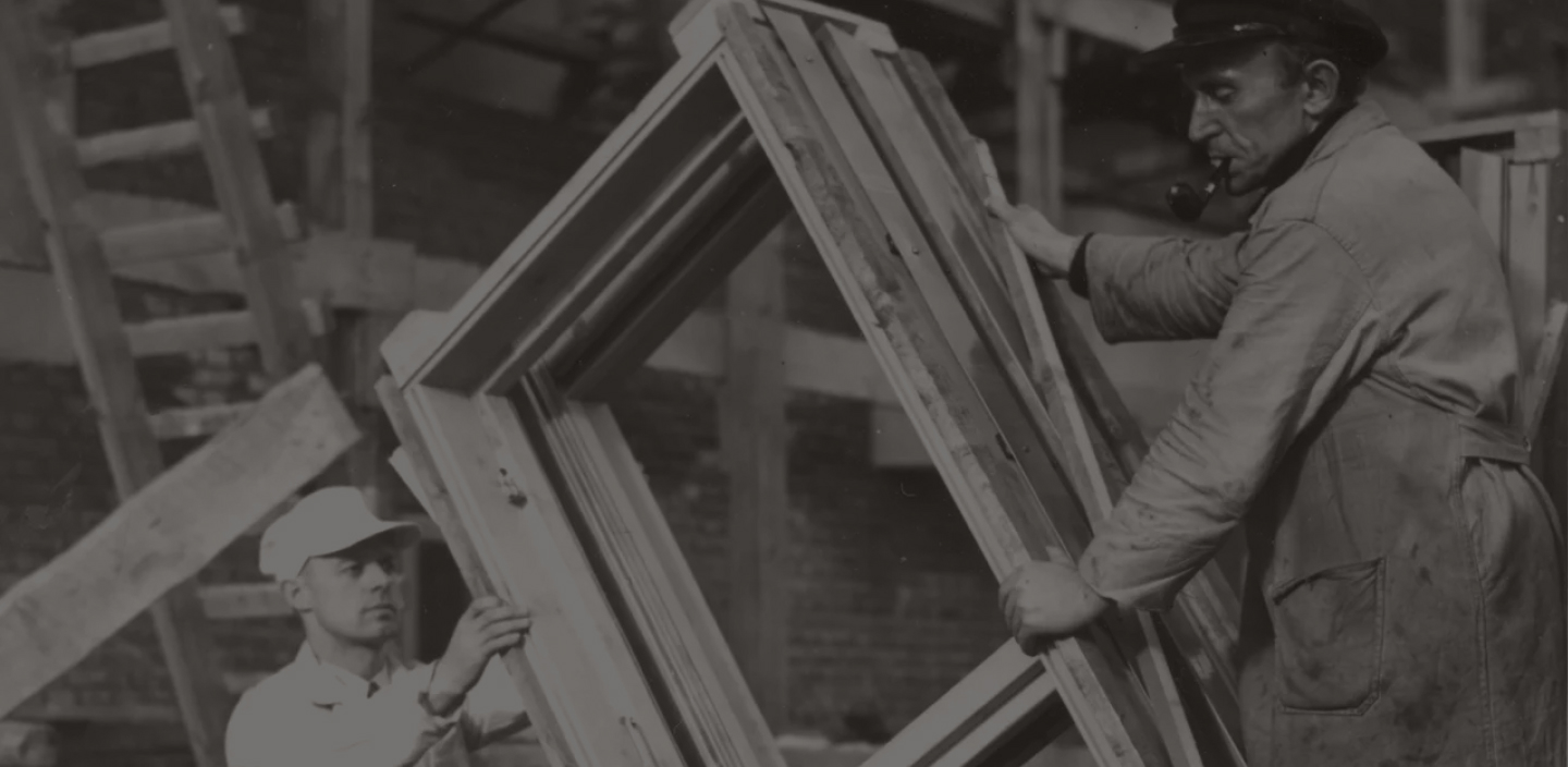 VELUX-certified installers on residential roof completing a VELUX Skylight System installation