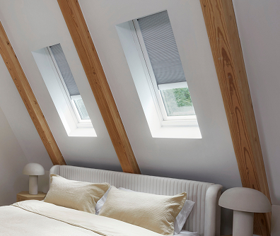 VELUX Skylight System installation in progress — professional installer on roof fitting weathertight flashing kit