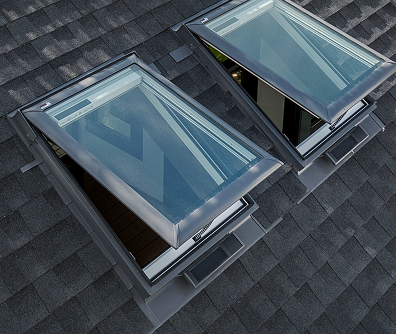 VELUX Skylight Systems installed on residential roof — exterior view showing weathertight flashing and skylight deck seal