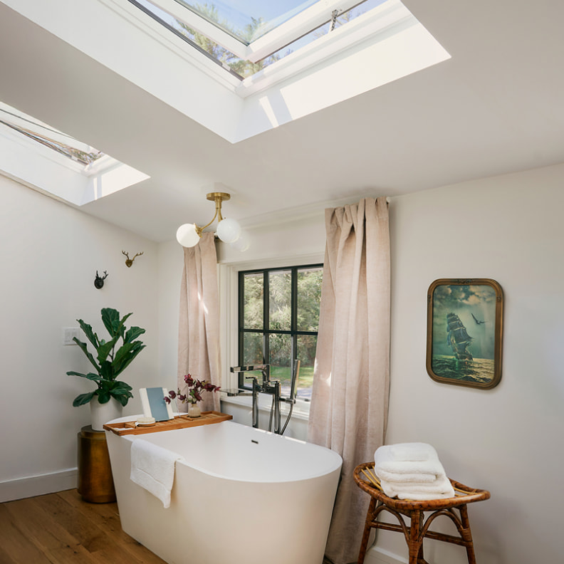 Kitchen interior after VELUX Skylight System installation — sunlit space with natural daylight from ceiling skylight