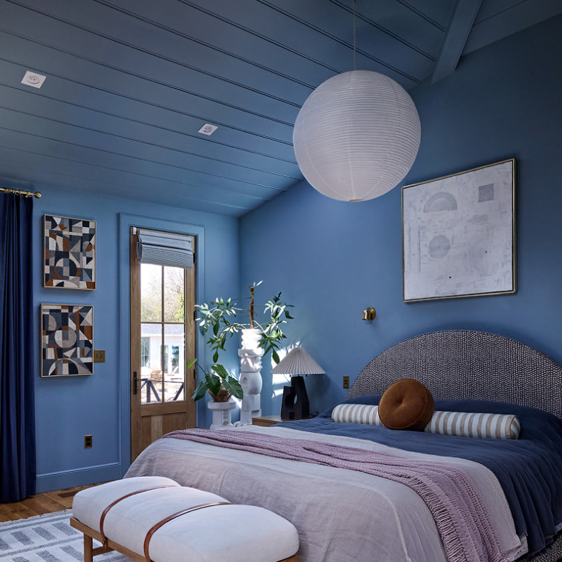 Bedroom interior before VELUX skylight installation — minimal natural light