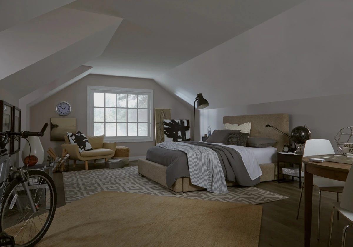 Bedroom interior before VELUX skylight installation — minimal natural light