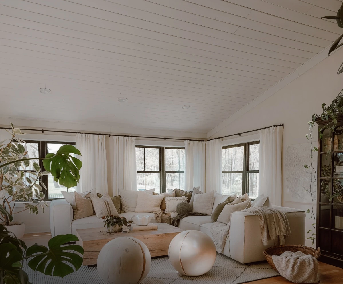 Living room interior before VELUX skylight installation — low natural light from windows only