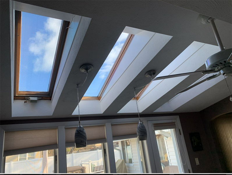 bright and open laundry room after installing skylights